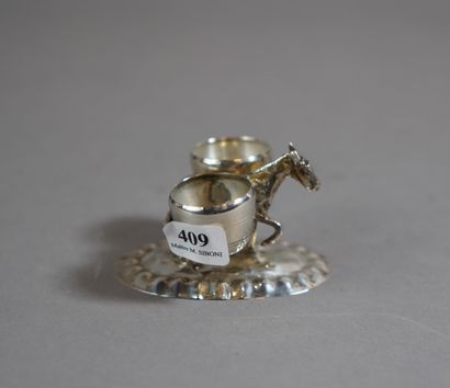 null 409- Salière à décor de mule en argent anglais

Pds : 50 g