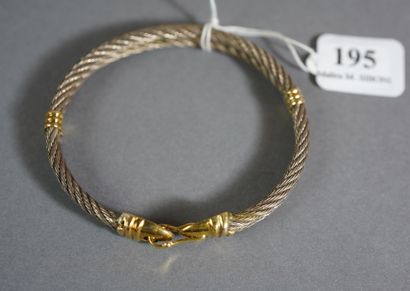 null 195- Bracelet en or et acier

Pds : 22,7 g