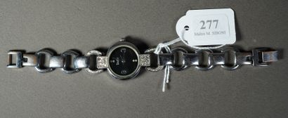 null 
277- TRESOR Montre de femme, bracelet acier
