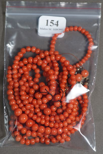 null 154- Collier de perles de corail (accidents)