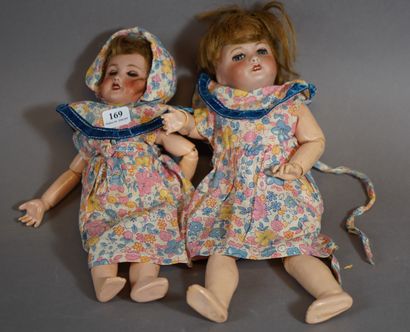 169- Deux poupées dont une Unifrance 
Têtes...