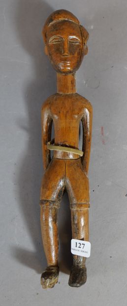 127- Statuette masculine en bois sculpté...