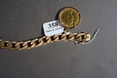 null 358- Gold bracelet and its pendant ''Florin'' in gold Pds : 73,70 g