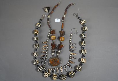 35- Lot of ethnic jewelry: three necklaces...