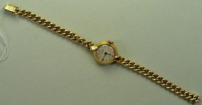 MATHEY TISSOT Une montre de dame en or Pds brut: 17,6 gr