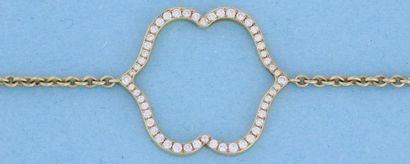 null Bracelet en or orné d'un motif central double face serti de diamants et d'émail....