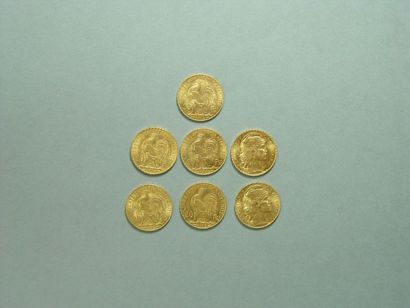 null Lot comprenant une pièce de 20 Francs datée 1912, trois pièces de 20 Francs...
