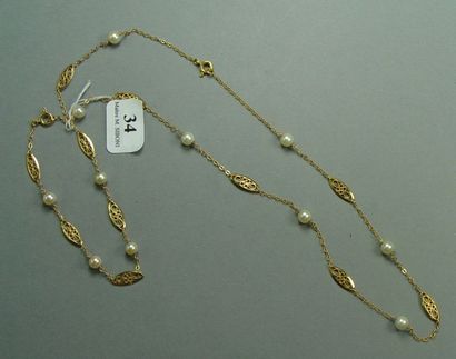 Collier et bracelet en or jaune et perles...