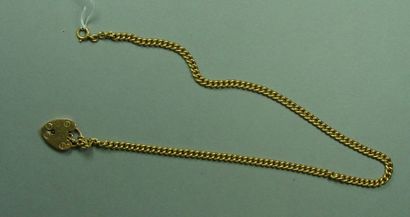 null Chaîne de cou e or jaune (pds: 10 g) et pendentif "cadenas" en or 14 K
Pds total:...