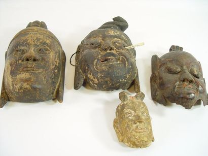 null Tête et trois masques taoïstes en bois anciennement polychrome
Chine. XIXème...