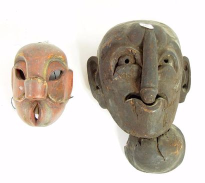 null Deux masques en bois sculpté: «Front» et «Vie» en forme de phallus
Hauteur:...