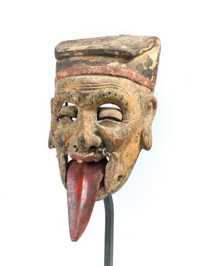 null Masque articulé en bois polychrome
Hauteur: 29 cm