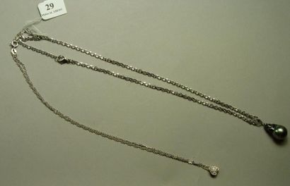 null Pendentif perle de Tahiti grise baroque et chaîne soutenant un pendentif "Coeur"...