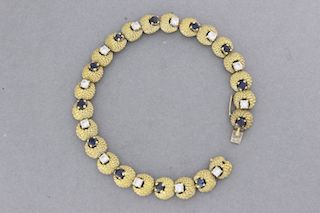 null Bracelet en or orné de saphirs alternés de brillants
Pds: 23,3 g