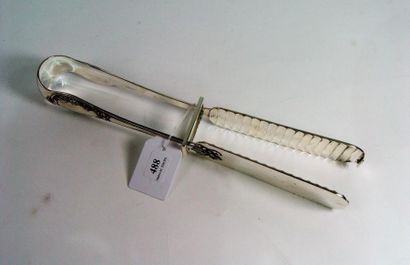 null 488- Pince à asperges en métal argenté à décor d'un noeud et de feuillages