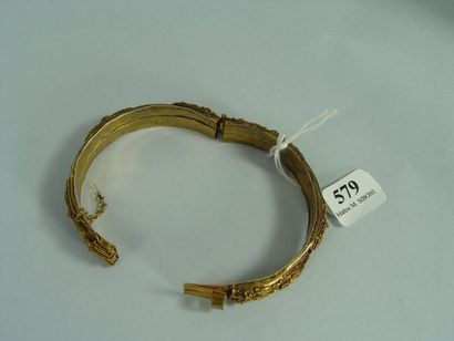 null 579- Bracelet articulé en écaille et métal doré