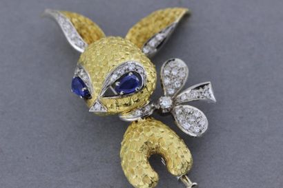 null 172- Broche "Lapin" en or enrichie de brillants, les yeux sertis de saphirs

Pds...