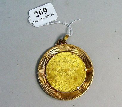 null 269- Pièce de 20 dollars montée en pendentif, monture en or jaune

Pds net :...