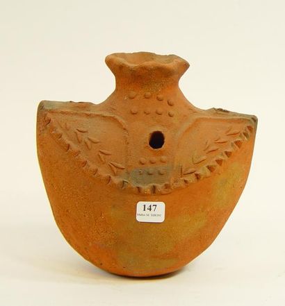 null 147- Vase en terre cuite

Hauteur : 18 cm