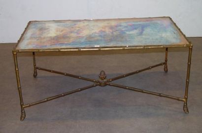 null 348- Table basse, piétement en bronze imitant le bambou

Plateau en verre

39...