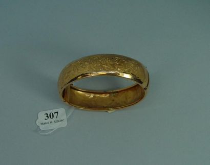 null 307- Bracelet articulé en or jaune

Pds net : 16,40 g