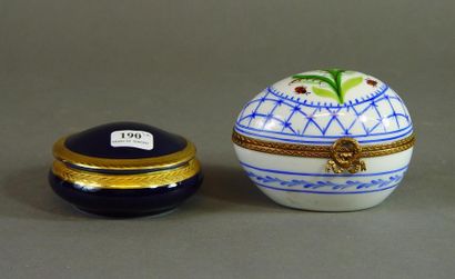 null 190- Nina RICCI

Boîte ''oeuf'' en porcelaine de Limoges et boîte en porcelaine...