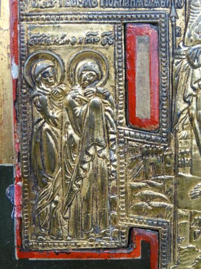 null 70- Icône ornée en son centre d'une croix en bronze entourée de scènes de la...
