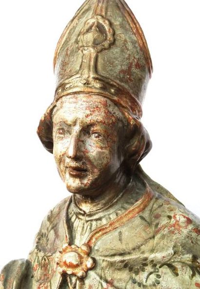 null 76- Buste reliquaire en bois polychrome et doré représentant Saint Urbain. Le...