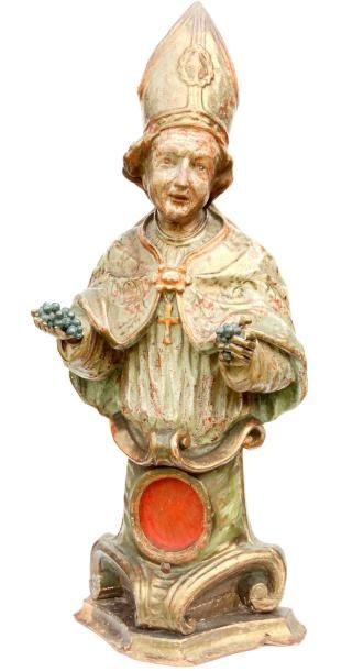 null 76- Buste reliquaire en bois polychrome et doré représentant Saint Urbain. Le...