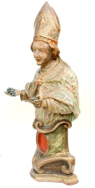 null 76- Buste reliquaire en bois polychrome et doré représentant Saint Urbain. Le...