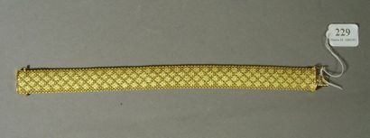 null 229- Bracelet tressé en or jaune

Pds net : 40,60 g