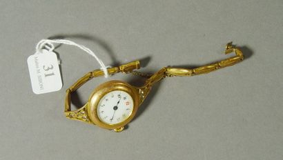 null 31- Montre bracelet en or jaune

Bracelet en métal doré

Pds brut : 22 g