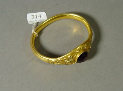 null 314- Bracelet articulé en pomponne serti d'une pierre violette