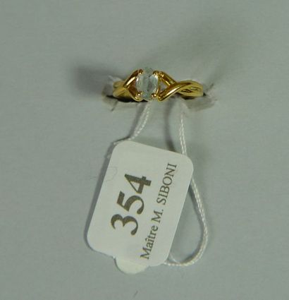 null 354- Bague en or jaune sertie d'une aigue-marine

Pds : 1,60 g