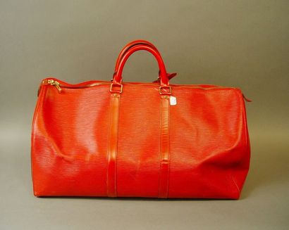 null 362- Louis VUITTON

Sac en cuir strié rouge