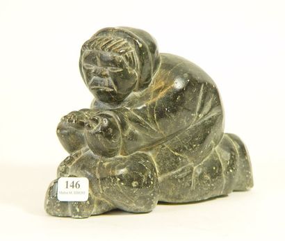 null 146- ''Inuit à genoux''

Sculpture en serpentine signée sous la base et datée...