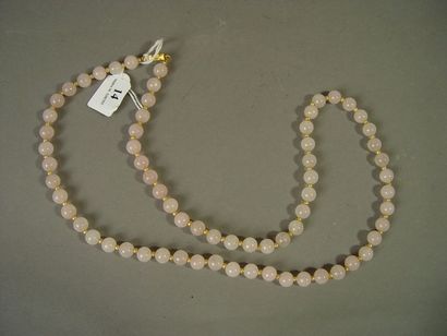 null 14- Sautoir en quartz rose

Longueur : 71 cm