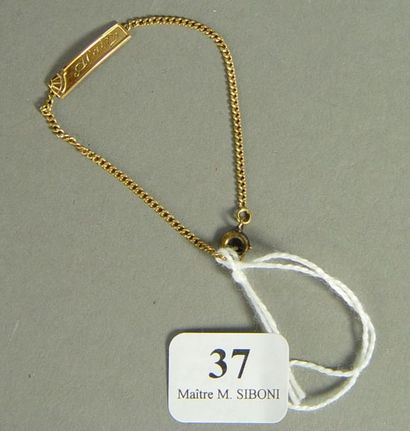 null 37- Bracelet d'identité en or

Pds : 1,72 g