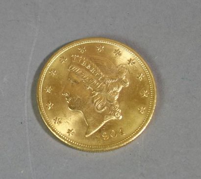 null 
140-e- Pièce de 20 dollars en or datée 1904           950/1100 €

