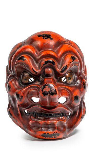 JAPON - Epoque TAISHO (1912 - 1926) 
Masque de démon en bois laqué rouge et noir...