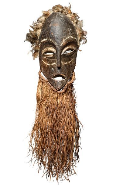 Bearded mask made of wood, feathers and fibres
Democratic...
