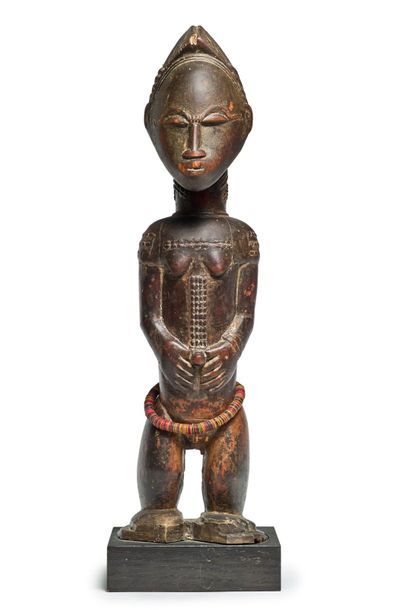 null Statuette féminine en bois 
Baoulé, Côte d'Ivoire XXème
H: 40 cm