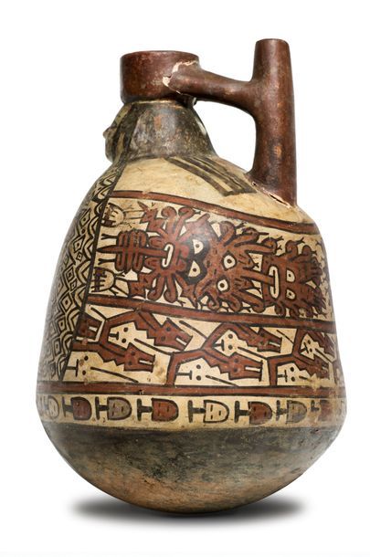 null Anthropomorphic
vase The dignitary is dressed in a long tunic with geometric...