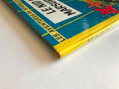 null Spirou 12 -Le nid des Marsupilamis
Seconde édition dos jaune de 1964. Rare album...