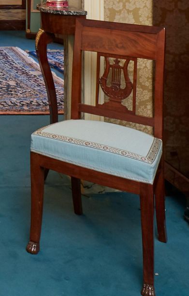 null Pair of mahogany and mahogany veneer chairs with flat backs and openwork lyre...