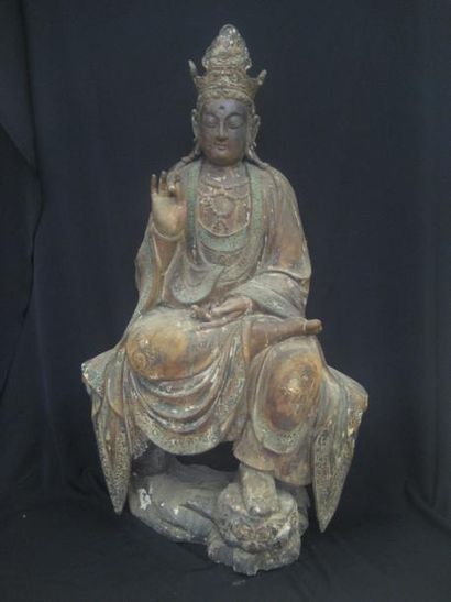 null Bodhisattva assis en méditation sur un trône, la tête ceinte d'une couronne...