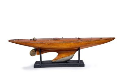 null Model of an unrigged "shark" type yacht. Hollow wooden hull, deck with figured...