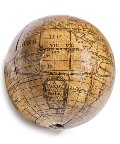 null Ptolemaic armillary sphere made of cardboard and engraved papers resting on...