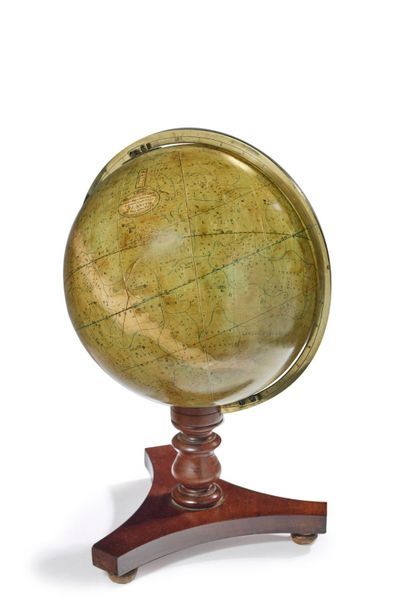null Celestial Globe
Brass meridian circle and mahogany base. signed SMITH
England,...
