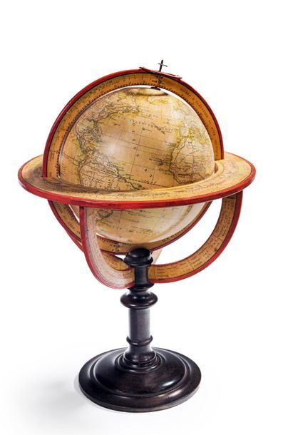 null Globe made of cardboard and engraved paper. Turned blackened wood base. 4 quarters...
